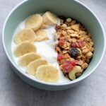 homemade granola served in a bowl with yoghurt and fresh fruit, healthy pregnancy breakfast